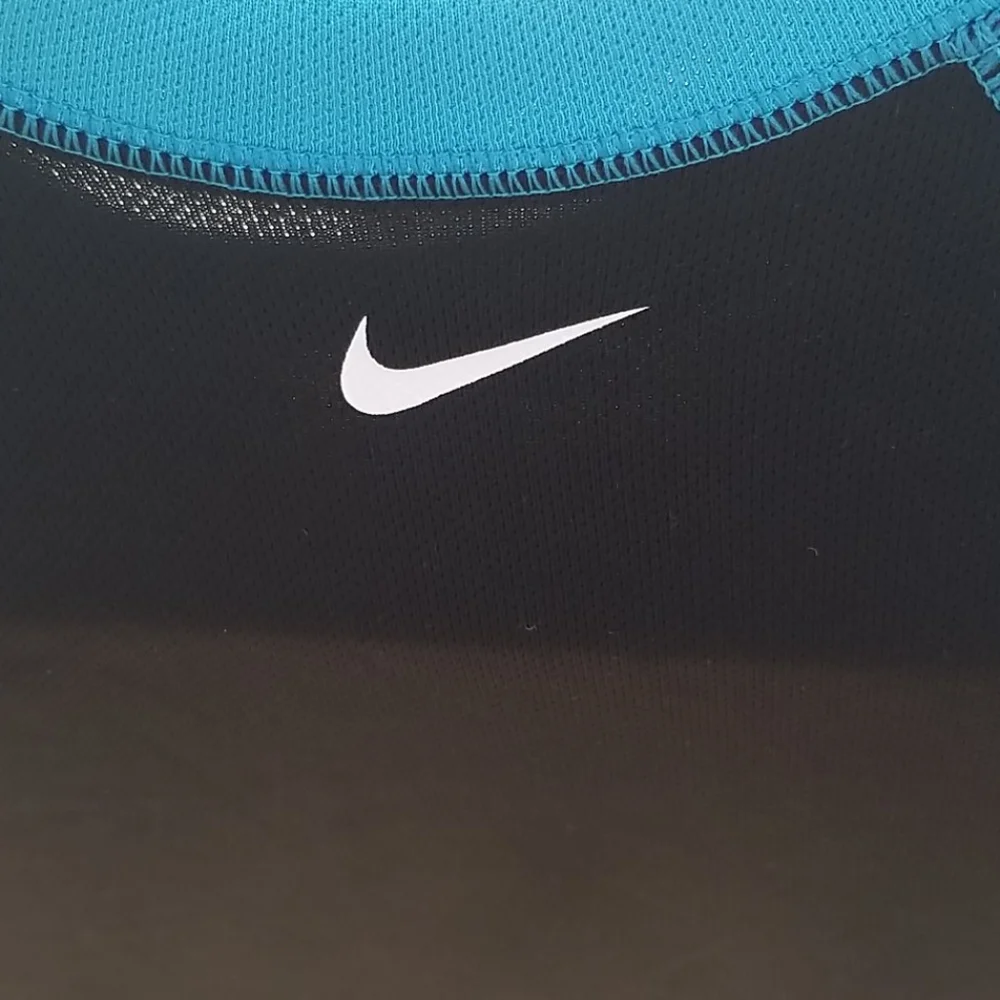 Nike black and teal rashguard size large